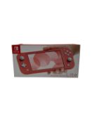 As new Nintendo Switch Lite in Coral (M/N: HDH-S-PAZAA JPN EAN: 4902370545302).