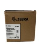 As new Zebra ZD230 Thermal Label Printer (P/N: ZD23042-D0ED02EZ) with 12 x Zebra 880191-076D Thermal