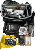 Assorted pre-owned cameras and accessories (Sold as seen).