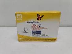 An as new Abbott FreeStyle Libre 2 flash glucose monitoring systems sensor (EXP: 2026-04-30).