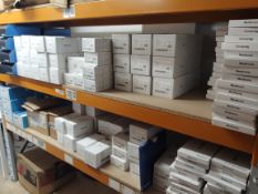 A large quantity of assorted Medtronic products (2 shelves).