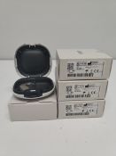 Four as new Oticon Engage BTE hearing aids in beige, in a white case.