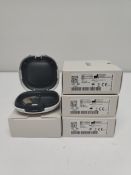 Four as new Oticon Engage BTE hearing aids in beige, in a white case.