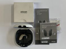 An Oticon Engage BTE Hearing Aid in Beige and White Case.