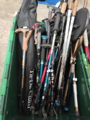 A quantity of pre-owned Nordic walking poles and related items.