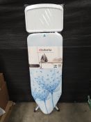 An as new Brabantia Ironing Board C - Cotton Flower 124 x 45cm (cellophane split at some of the feet