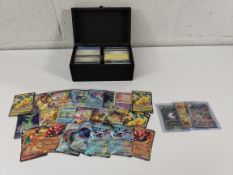 A quantity of assorted Pokemon trading cards.
