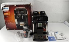 A Philips 2300 Series fully automatic espresso machine matte black, box packaging damaged (EP2336/40