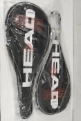 Two as new Head TI S6 silver/black tennis rackets with protective covers (stock image).