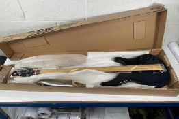 As new Yamaha bass guitar in translucent black (TRBX174EN).