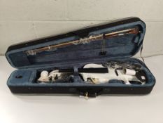 A Vangoa electric violin to include travel case and bow (requires bridge).