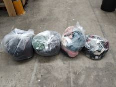 Four bags of as new and pre-owned clothing and hats to include Hugo Boss, Victoria Beckham and Oui.
