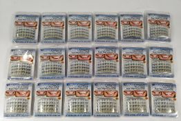 Eighteen as new Instant Smile tooth replacement kits.