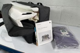 A Guava Family Lotus Play Yard and Lotus Fun Shade (sold as seen).