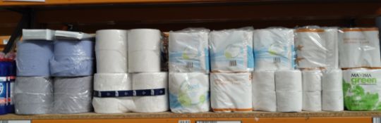 A quantity of assorted cleaning and hygiene related products on one shelf.