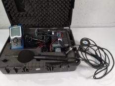 A pre-owned NTi Audio XL2-TA sound level meter with accessories and case.