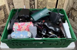 Approximately sixty pairs of sunglasses and eyewear to include Ray-Ban, Polo and related.