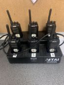 Six pre-owned Vitai VT-8800 Crystal radios with a Vitai 6-way multi-unit charger. Sold as seen.