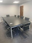 The contents of room to include a large conference table, 10 x meeting chairs and 2 x cabinets.