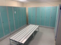 The Contents of Changing Rooms to Include Lockers and Bench.