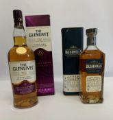 Bushmills single malt Irish whisky aged 12 years 700ml and The Glenlivet triple cask matured single