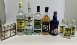 Eight assorted rums to include Bacardi Superior 1ltr, Dead Man's Finger hazelnut 700ml, Wray & Nephe