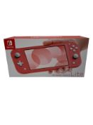 As new Nintendo Switch Lite in Coral (M/N: HDH-S-PAZAA JPN EAN: 4902370545302).