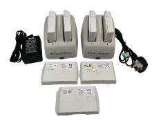 Seven pre-owned Verathon BladderScan 0400-0066 Batteries with two Charging Docks.