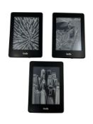 Three pre-owned Kindle Paperwhite 7th Gen DP75SDI E-Readers.