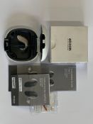 An Oticon Engage BTE Hearing Aid in Beige and White Case.