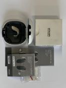 An Oticon Engage BTE Hearing Aid in Beige and White Case.