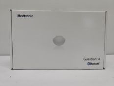 An as new Medtronic Guardian 4 Transmitter Kit (REF: MMT-7840W1, Recharge By Date: 2025-04-22).