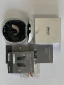 An Oticon Engage BTE Hearing Aid in Beige and White Case.