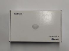 An as new Medtronic Guardian 4 Transmitter Kit (REF: MMT-7840W1, Recharge by Date: 2025-06-24).