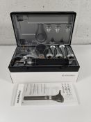 An as new Riester 3.5v xenon otoscope with C-handle, comes with two lithium batteries (REF: 3860).
