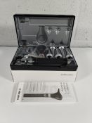 An as new Riester 3.5v xenon otoscope with C-handle, comes with two lithium batteries (REF: 3860).