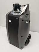 A pre-owned O2 Concepts Oxlife independence mobile oxygen concentrator to include two li Lon batteri