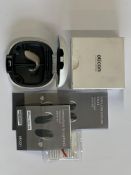 An Oticon Engage BTE Hearing Aid in Beige and White Case.