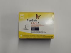 An as new Abbott FreeStyle Libre 2 flash glucose monitoring systems sensor (EXP: 2026-06-30).