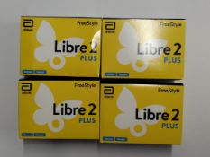 Four boxes of as new FreeStyle Libre 2 Plus Flash Glucose Monitoring Systems (EXP: 2026-04-30).