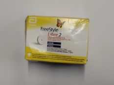 An as new Abbott FreeStyle Libre 2 flash glucose monitoring systems sensor (EXP: 2026-05-31).