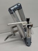 A pre-owned Unbranded Trimano surgical arm patient positioner.