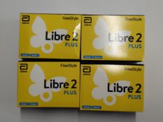 Four boxes of as new FreeStyle Libre 2 Plus Flash Glucose Monitoring Systems (EXP: 2026-04-30).