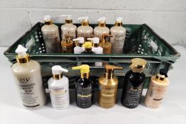 Eighteen assorted beauty products to include Lumin, Gold and Easy Glow, bottle labels slightly distr