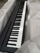A Yamaha P-45B digital piano (may need some repairs to some keys, sold as seen).