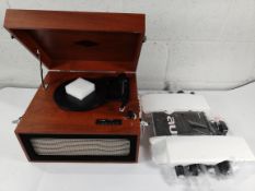 An Auna turntable/record player with some minor damage (sold as seen).