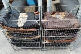 A quantity of mainly pre-owned leather waistcoats in two baskets.