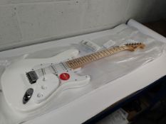 An as new Squier Sonic Stratocaster MN, HT, Arctic White.