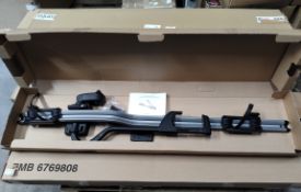 A Volvo roof mounted bicycle holder, boxed with manual (EMB6769808).