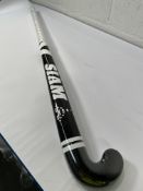 An as new SIAM hockey stick - black/white - length 36.5, weight 510, balance point 40.
